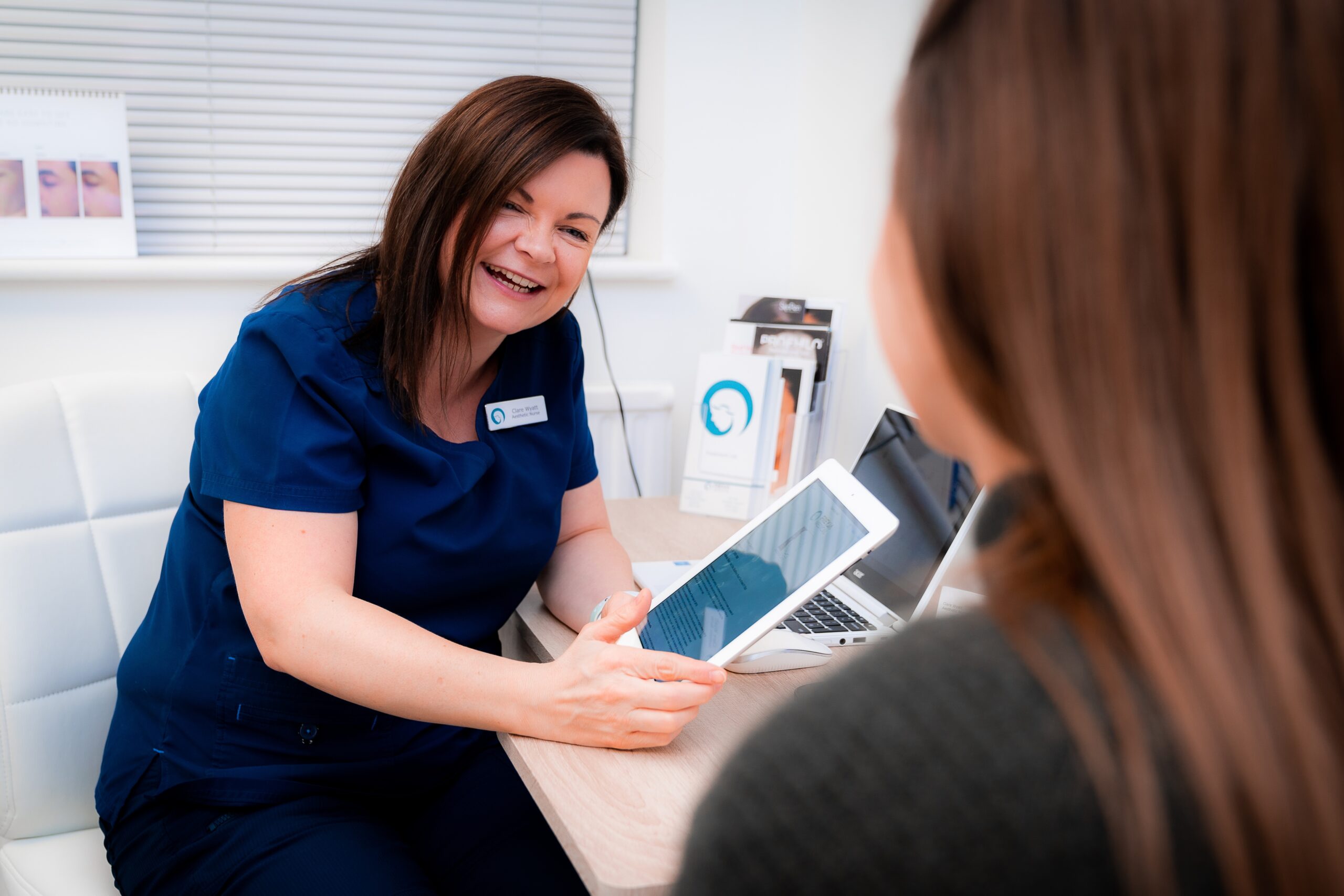 Nurse Clare Wyatt performing an Aesthetic Consultation at Freyja Medical