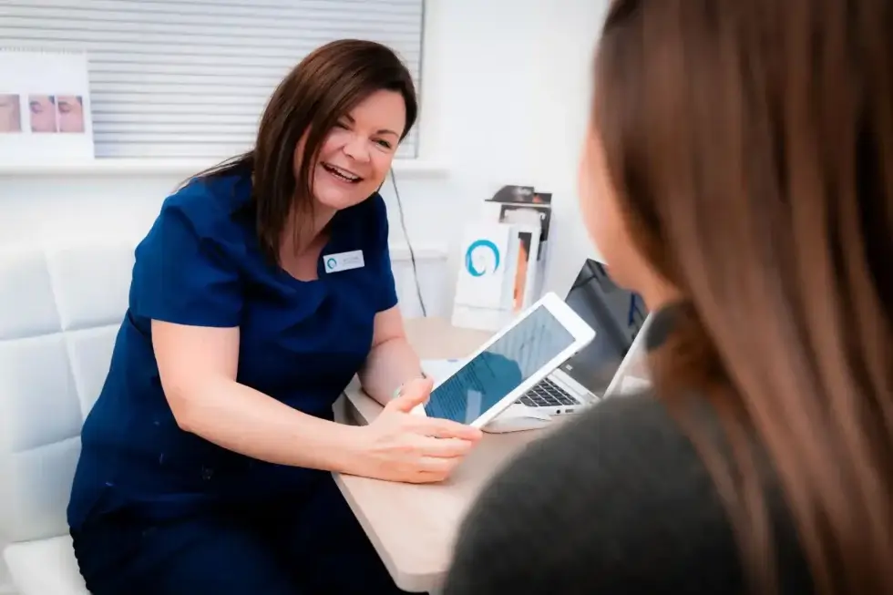 Nurse Clare Wyatt performing an Aesthetic Consultation at Freyja Medical
