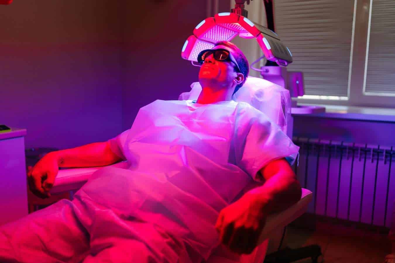 Patient wearing protective eyewear during photodynamic therapy treatment.